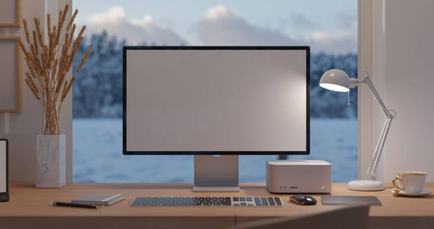 PCの白いデスクトップ画面のモックアップ、テーブルランプ、およびウィンドウを介して湖の景色に対する木製のテーブル上のアクセサリーと現代の豪華なワークスペース。3Dレンダリング、 3Dイラスト - 写真・画像