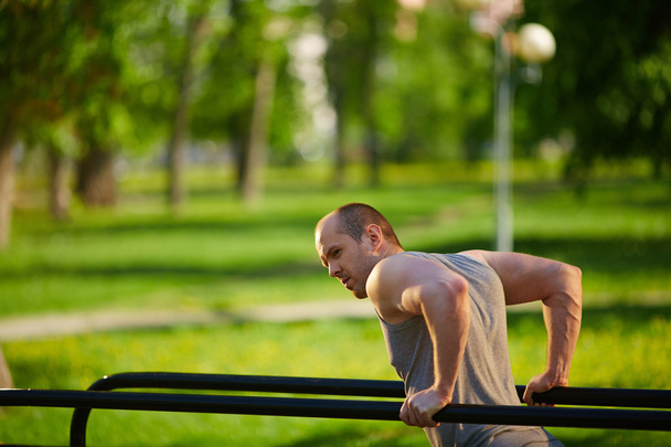 Man having physical training - Photo, Image
