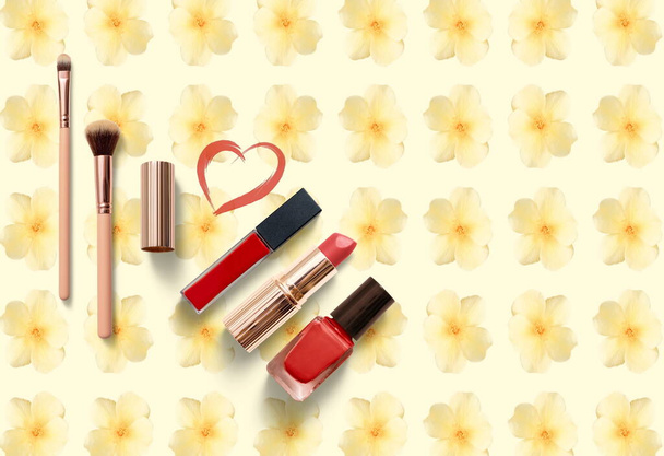 make up red lipstickbrushes on floral light yellow  with heart and lips shape  background fashion  template, copy space banner    fashion Women accessories - Photo, Image