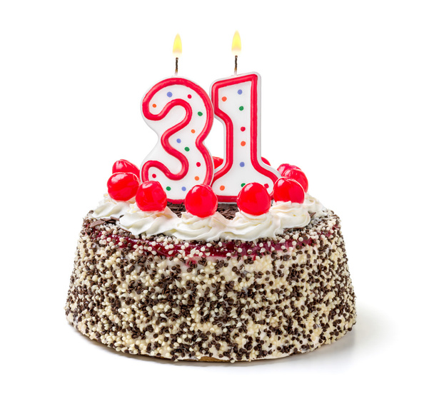 Торт на день народження з палаючою свічкою
 - Фото, зображення