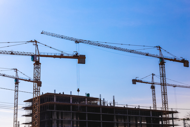 Building cranes on construction - Photo, Image