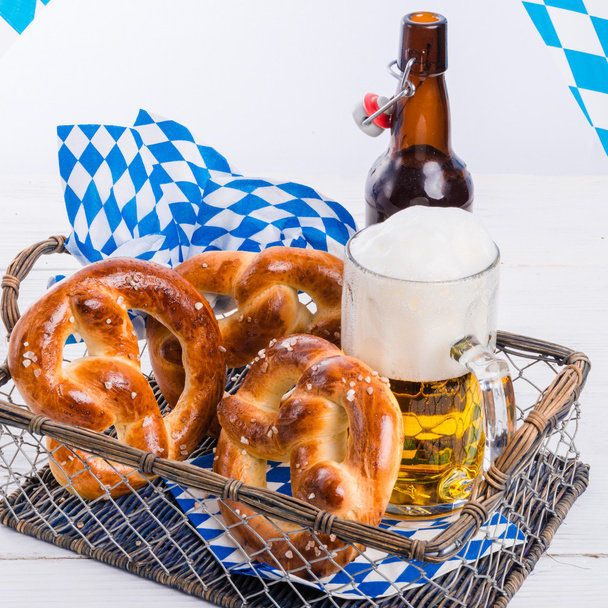 homemade pretzels and bavarian beer - 写真・画像