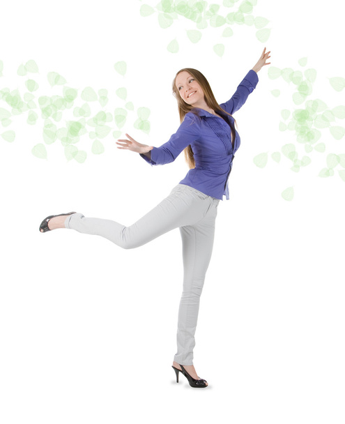 Young happy woman standing against white background - Foto, Imagen