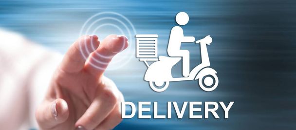 Woman touching a delivery concept on a touch screen with her finger - Photo, Image