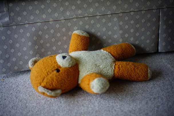 teddy bear with toy on a wooden background - Фото, зображення