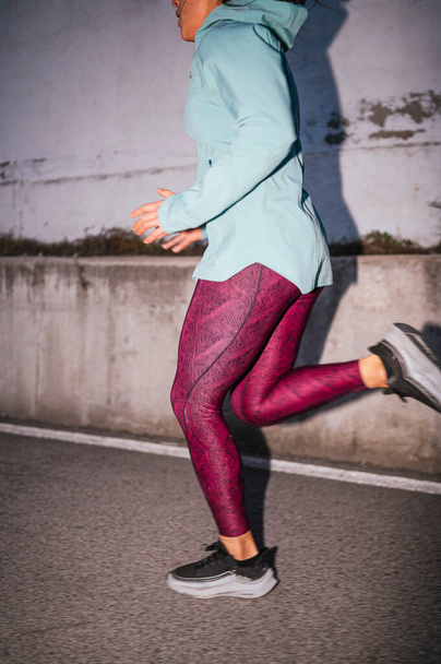 Sporty woman running in the city. - Foto, imagen