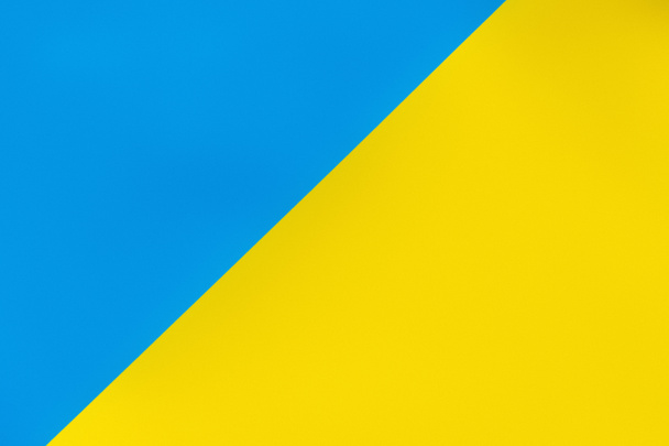 colorful blue and yellow geometric background, ukrainian concept - 写真・画像