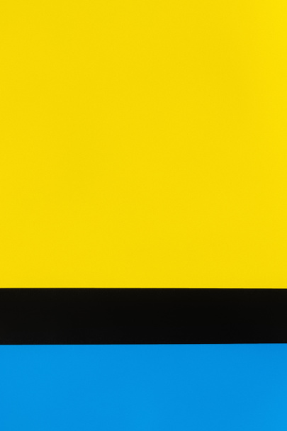 geometrické modré, černé a žluté pozadí s kopírovacím prostorem - Fotografie, Obrázek