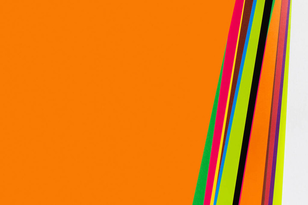 fényes háttér többszínű csíkokkal és narancssárga fénymásoló térrel - Fotó, kép