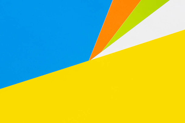 simple blue, yellow, orange, white and green polygonal background - Photo, Image