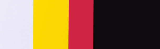 fondo geométrico con rayas negro, rojo, amarillo y lavanda, bandera - Foto, Imagen