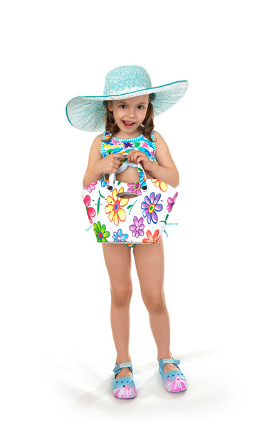 Little girl in a beach dress. - Foto, Imagen
