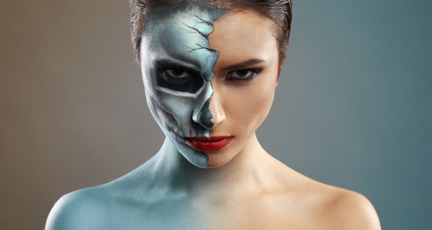 beautiful woman with makeup skeleton half - Zdjęcie, obraz