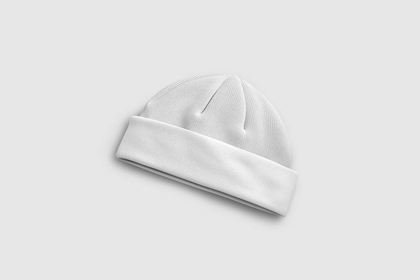 Sombrero de invierno en blanco aislado sobre fondo blanco. Representación 3D. Mock-up - Foto, imagen