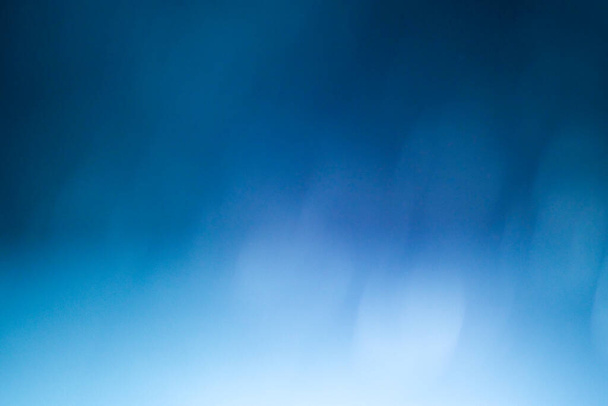 Donkerblauwe abstracte achtergrond met bokeh. Kleurrijke fonkelende lichten bokeh licht achtergrond. - Foto, afbeelding