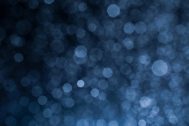 Dark blue abstract background with bokeh. Colorful twinkling lights bokeh light background. - Fotografie, Obrázek