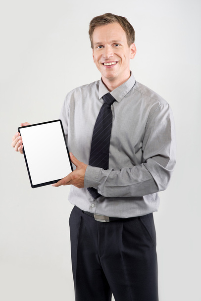 üzletember mutatja a tabletta - Fotó, kép
