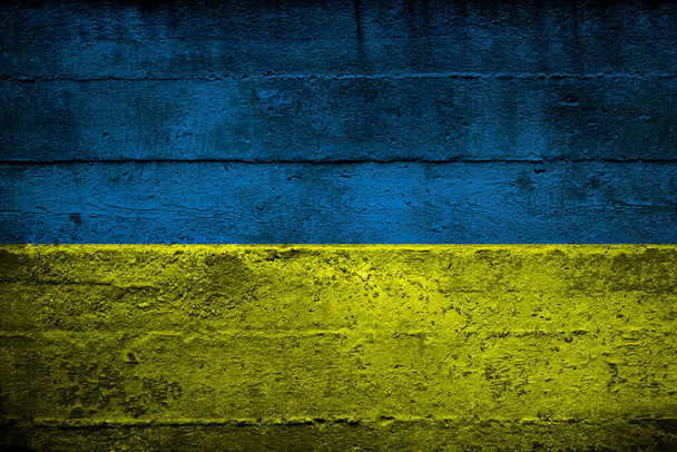 Blaue und gelbe Nationalfarben der Ukraine Flagge auf Beton Kopierraum Hintergrund - Foto, Bild