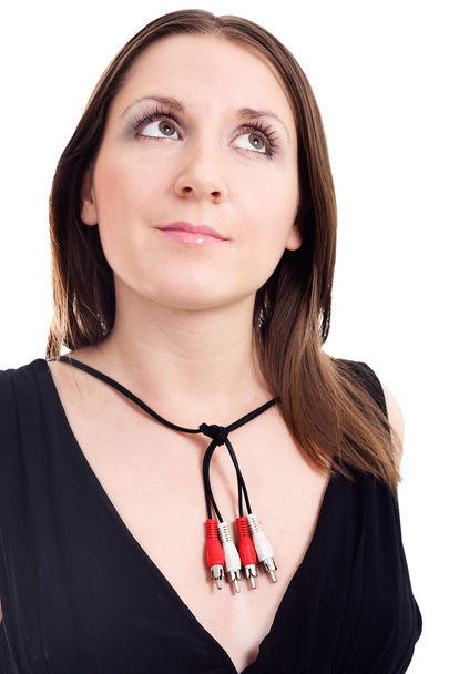 Woman with necklace made of audio plugs - Foto, Imagen