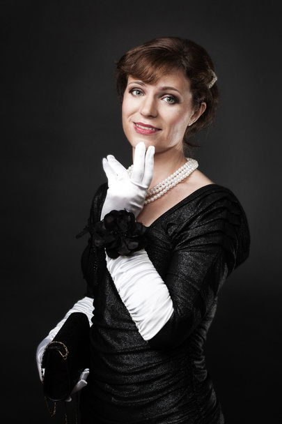 Respectable woman in white gloves - Foto, afbeelding