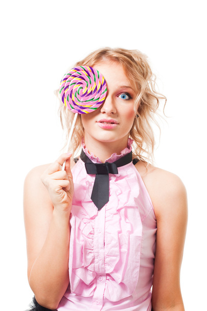 Woman with lollipop in pink dress - Zdjęcie, obraz