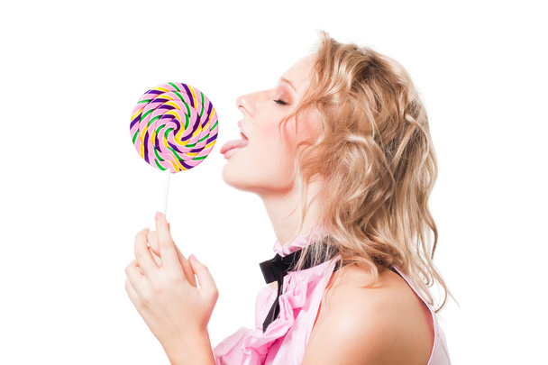 Blond girl lick lollipop - Фото, зображення