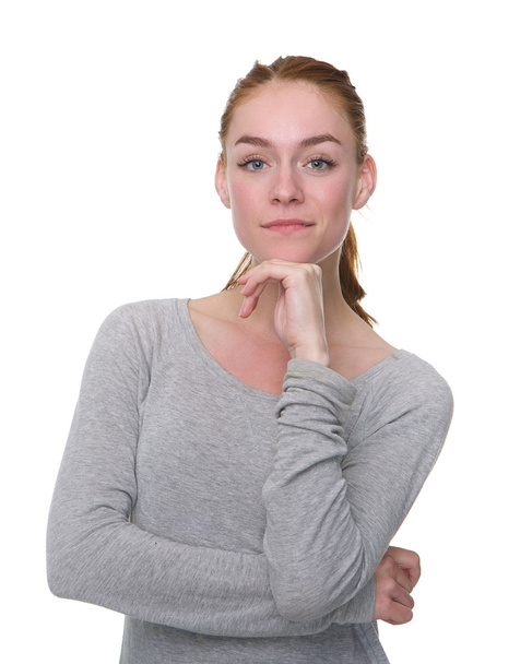 Serious young woman with hand on chin - Photo, Image