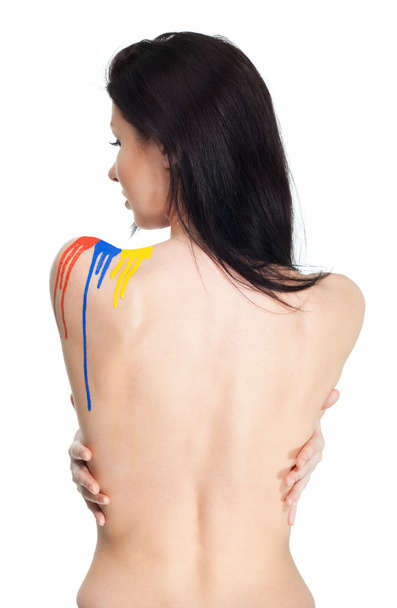 Back of woman with paint - Foto, Imagen
