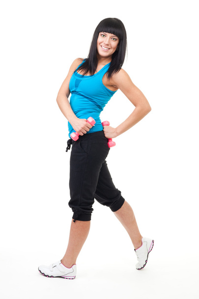 Fitness instructor posing with dumbbells - Φωτογραφία, εικόνα
