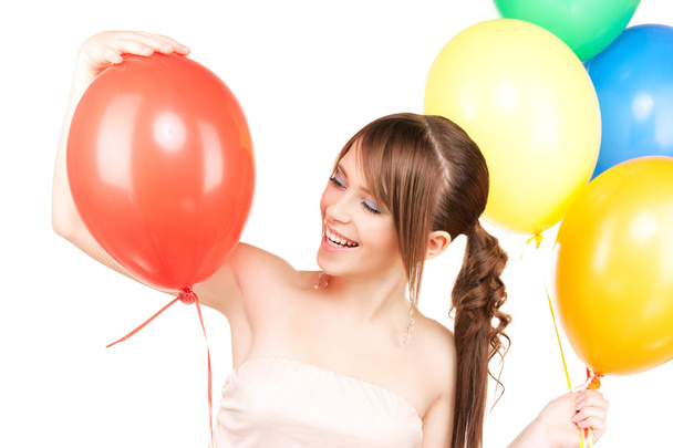 Happy teenage girl with balloons - Фото, изображение