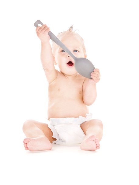 Baby boy with big spoon - 写真・画像