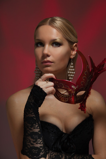 Blond woman and masquerade - Foto, afbeelding