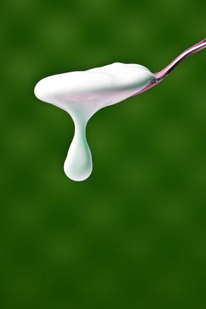 Spoon with yogurt - Φωτογραφία, εικόνα