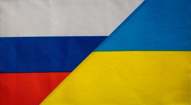 Banderas estatales de Rusia y Ucrania de cerca. - Foto, Imagen