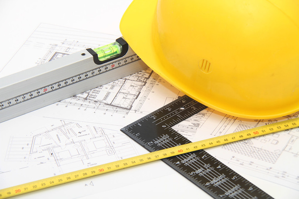 Helm en hulpmiddelen voor constructietekeningen en gebouwen - Foto, afbeelding