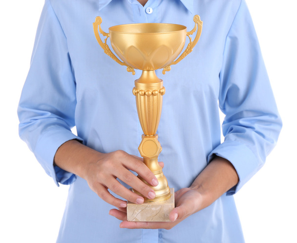 Mujer sosteniendo copa trofeo
 - Foto, Imagen