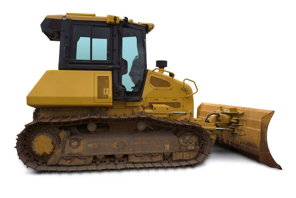 bulldozer op spoor gele machine bouwplaats apparatuur zwaar werk opgraving witte achtergrond - Foto, afbeelding