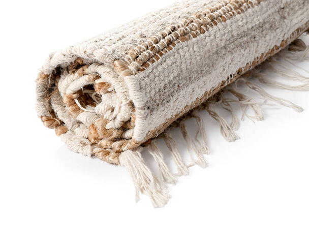 Roll of striped carpet on white background, closeup - Photo, Image