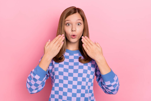 Photo of brown hairdo impressed teenager girl palms face wear blue sweater isolated on pink color background - Valokuva, kuva