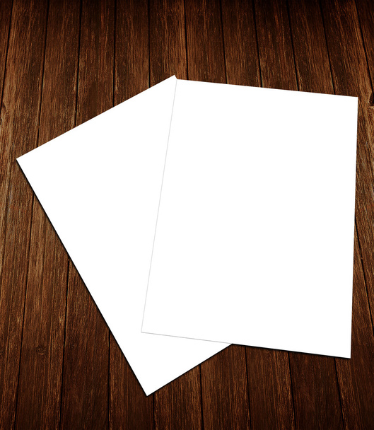 Blank white paper A-4 flyer collection on wooden background - Photo, Image