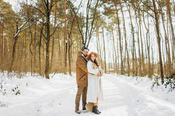 Family walks with pine forest in winter - Fotografie, Obrázek