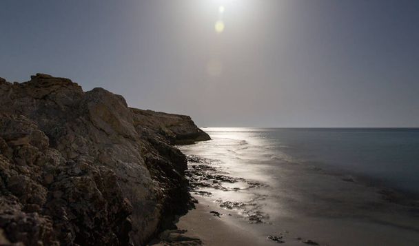Night seascape with moon. Ayia Napa, Cyprus. - Photo, Image