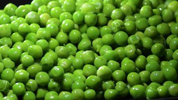 Green peas with intimate light gyrating - Footage, Video