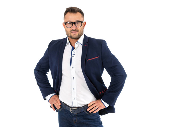 Portrait of a business man in glasses looking at the camera, isolated on white. - Foto, imagen