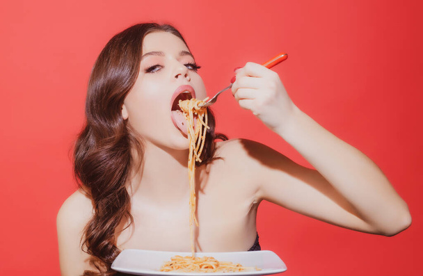 Bolognese pasta. Sexy woman eating Italian meal. Spaghetti. Healthy menu. - Фото, изображение