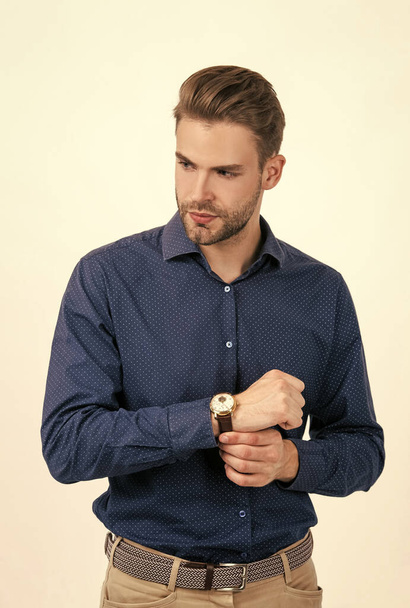 handsome man with stylish hair wear wristwatch isolated on white, male fashion - Foto, Bild