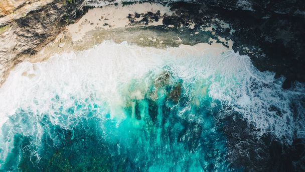 Aerial view to ocean waves. Blue water background - Фото, зображення