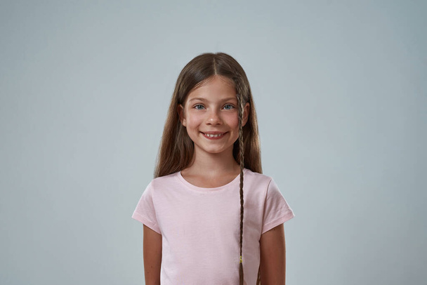 Portrait of european little girl looking at camera - Foto, Imagem