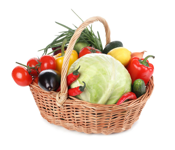 Fresh ripe vegetables and fruit in wicker basket on white background - Photo, Image