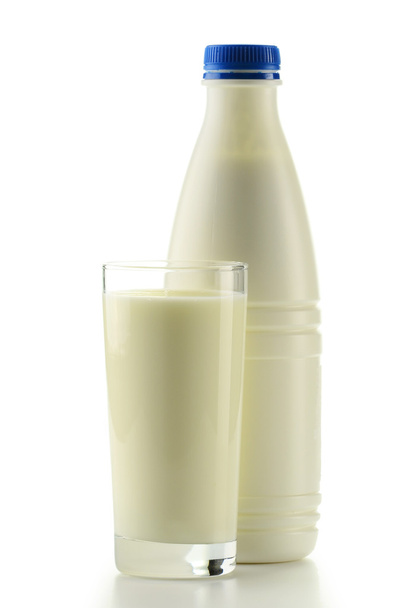 Plastic bottle of milk and glass isolated on white background - Valokuva, kuva